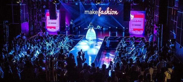 MakeFashion Runway Show, Model in glowing white dress