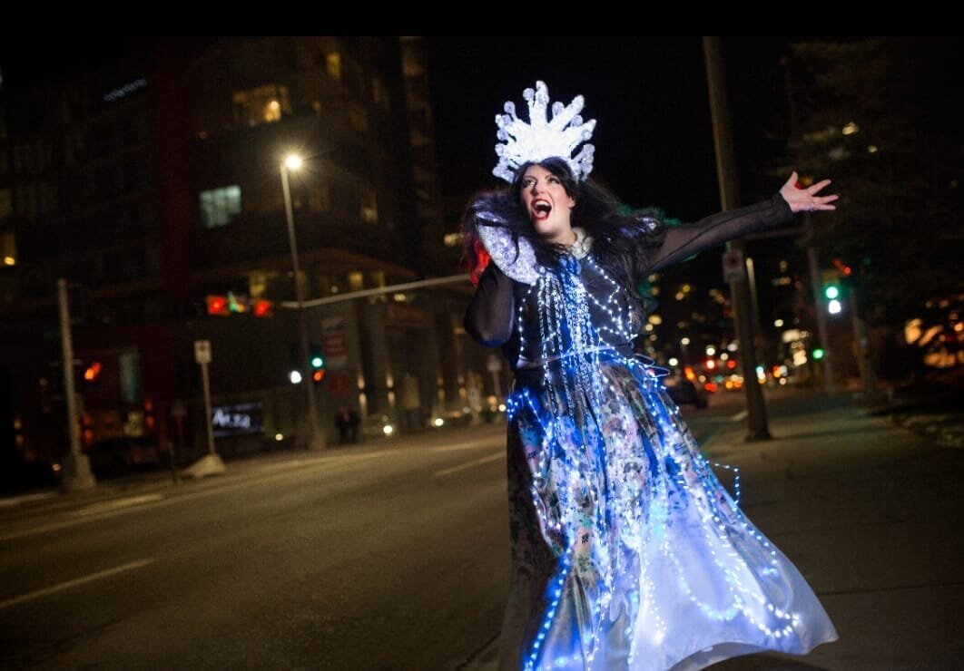 Opera singer wearing LED accessories