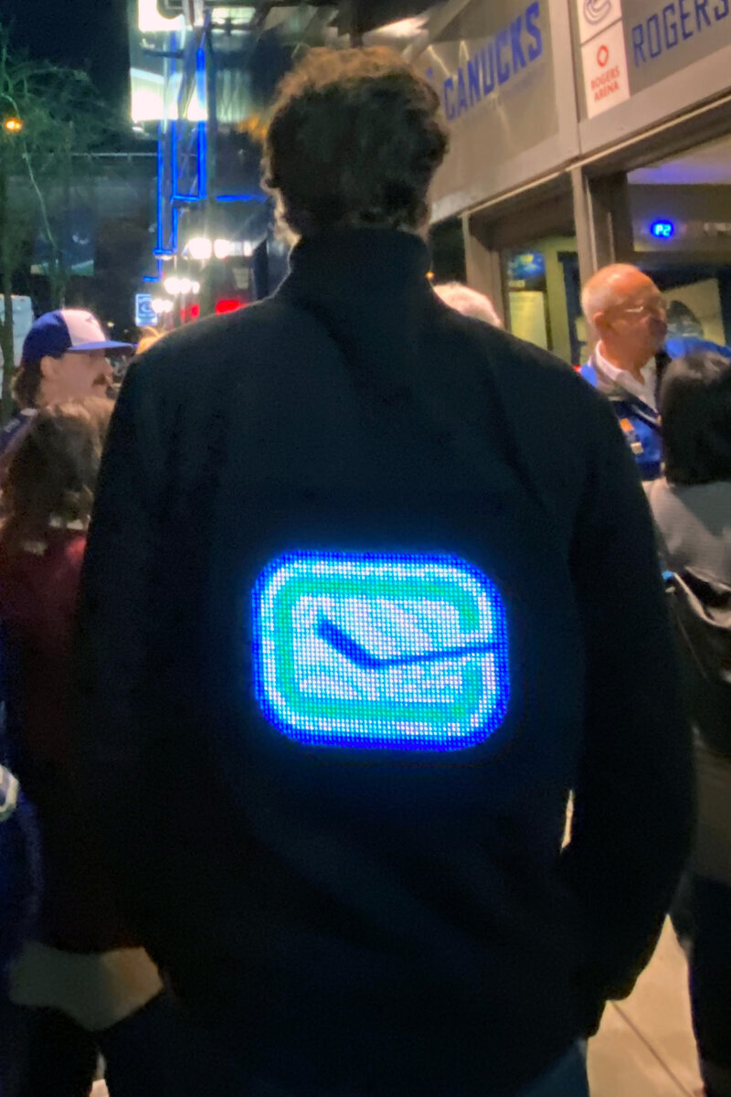 LED Matrix Hoodie, model wearing LED hoodie