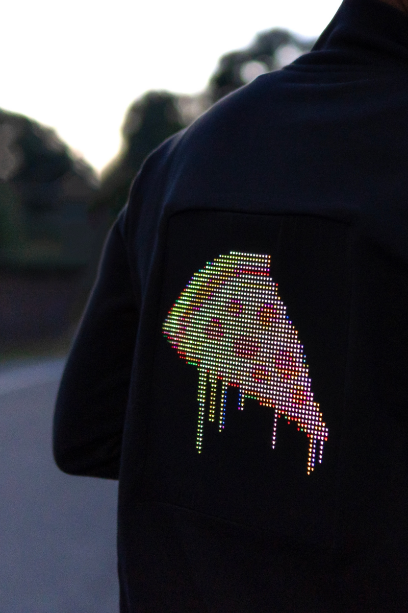 LED Matrix Hoodie, model wearing LED hoodie